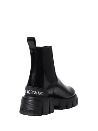 Moschino Love stivaletti in pelle con suola chunky nero