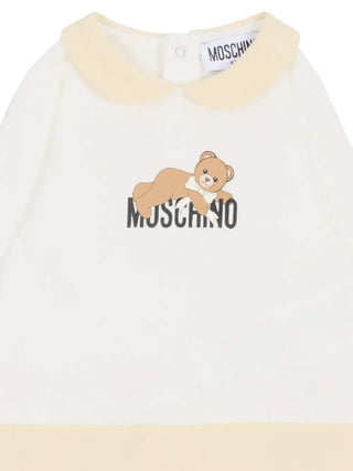 Moschino tutina unisex neonatocon piedini bianco beige MPY06ZLCA40 83631 MOSCHINO