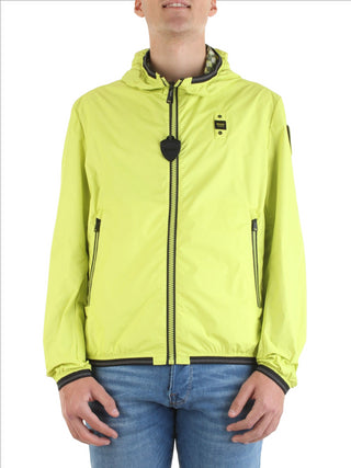 Blauer giubbino reversibile in nylon con cappuccio verde lime