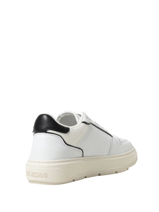 Moschino Love sneakers in pelle martellata con logo bianco